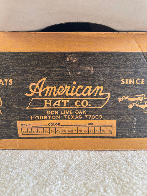 American Hat Co. wooden box label showing Houston, Texas address and size measurements