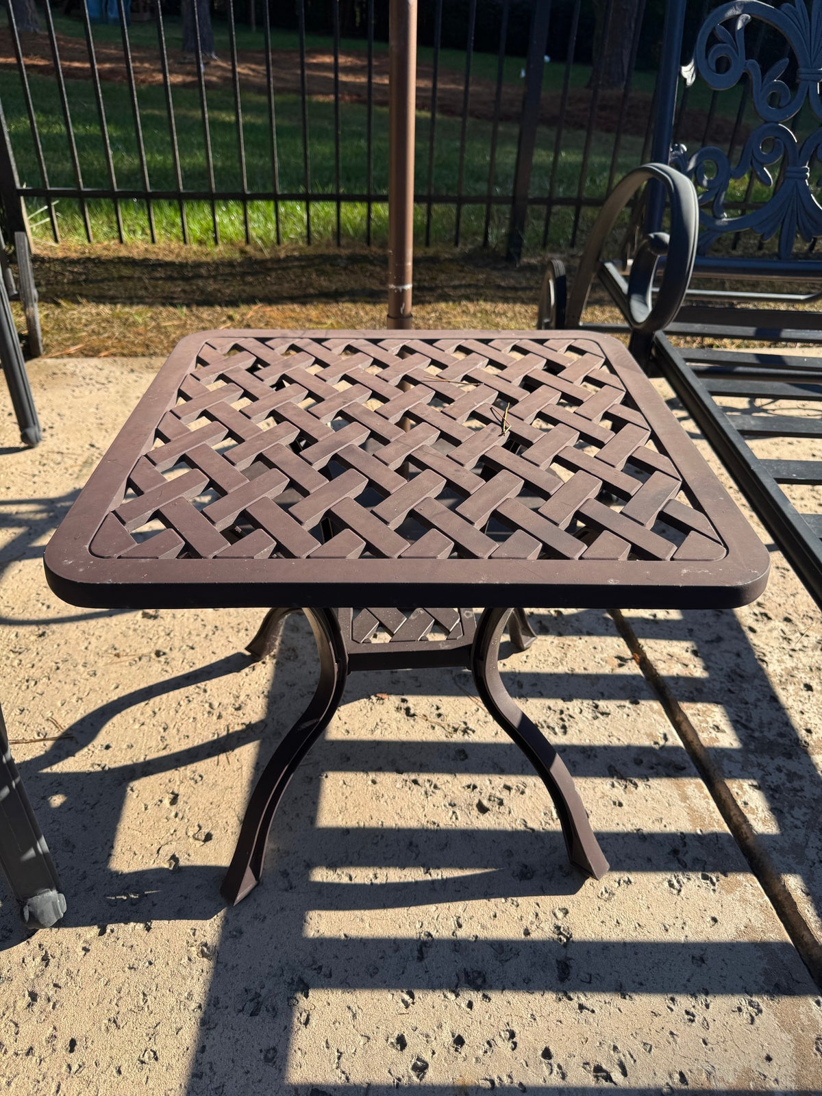 Two Cast Aluminum Chaise Loungers, Scrollwork, with Side Table and Umbrella, Poolside