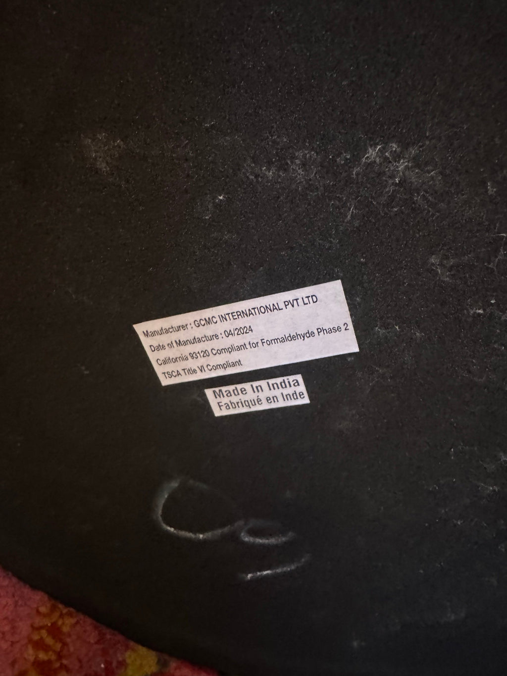 Maker label under a table