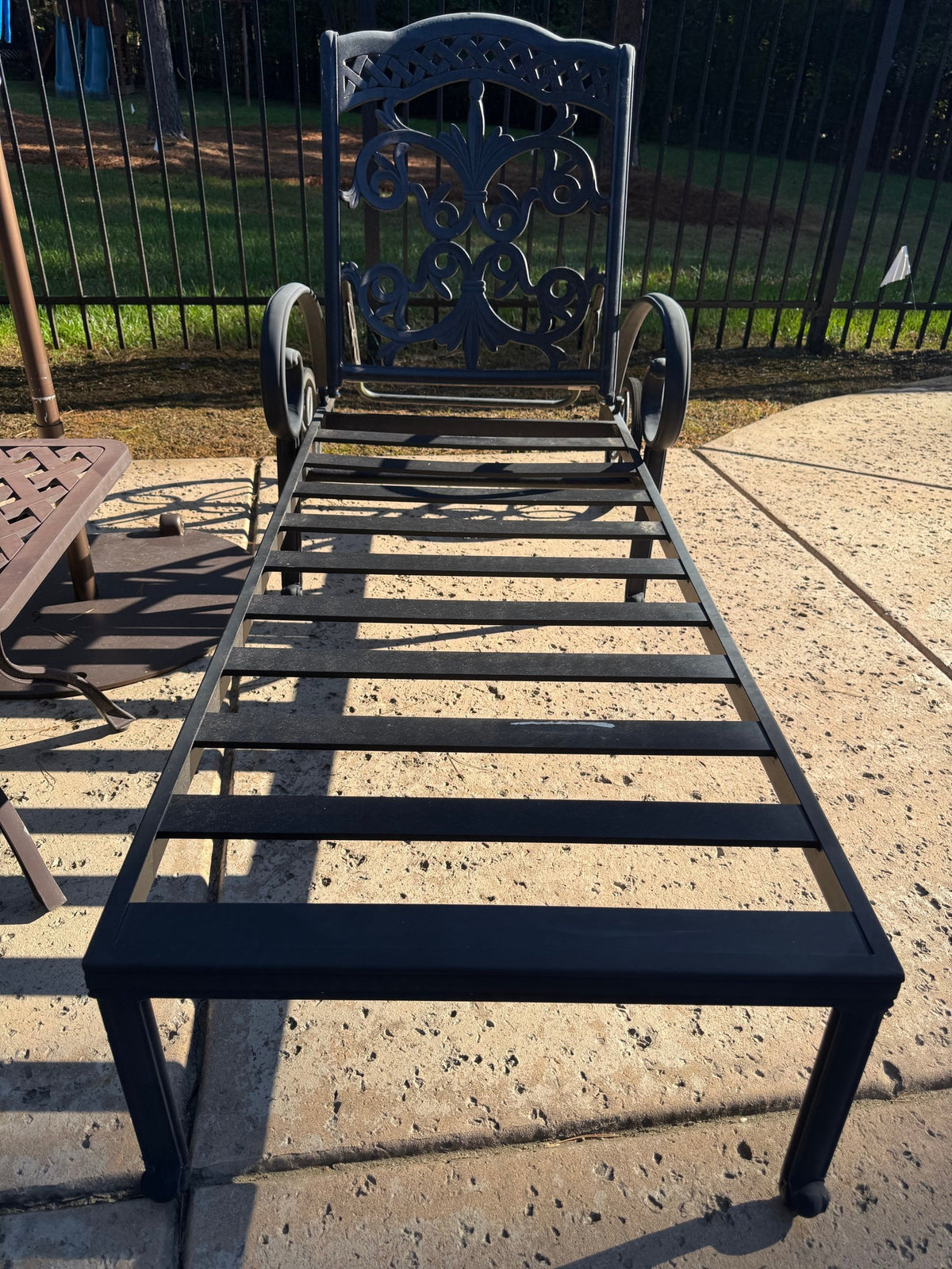 Two Cast Aluminum Chaise Loungers, Scrollwork, with Side Table and Umbrella, Poolside