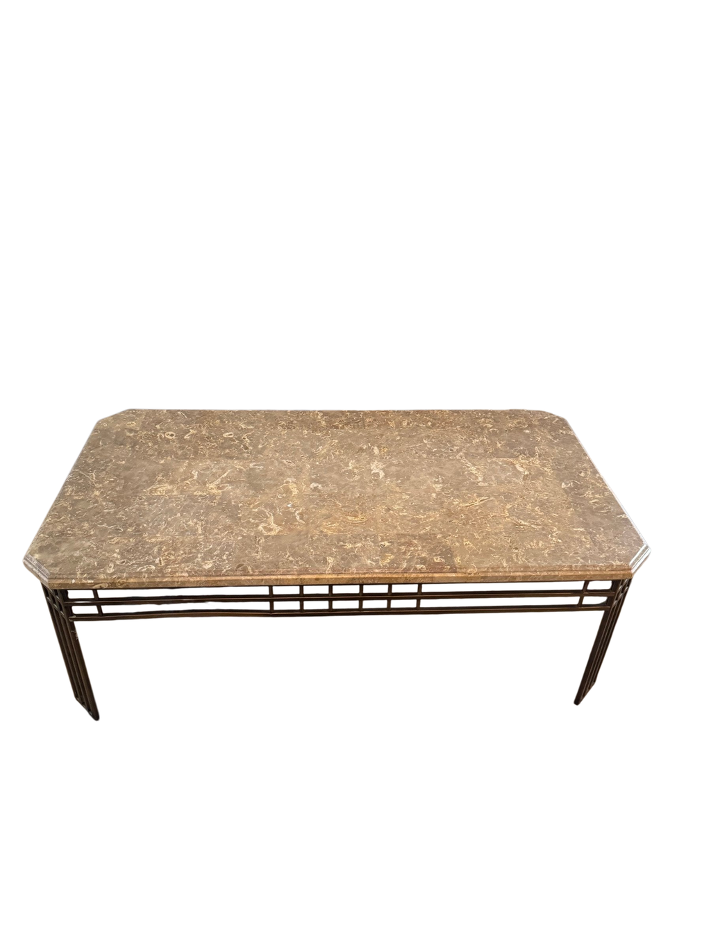 Marble-top coffee table in front of a fireplace