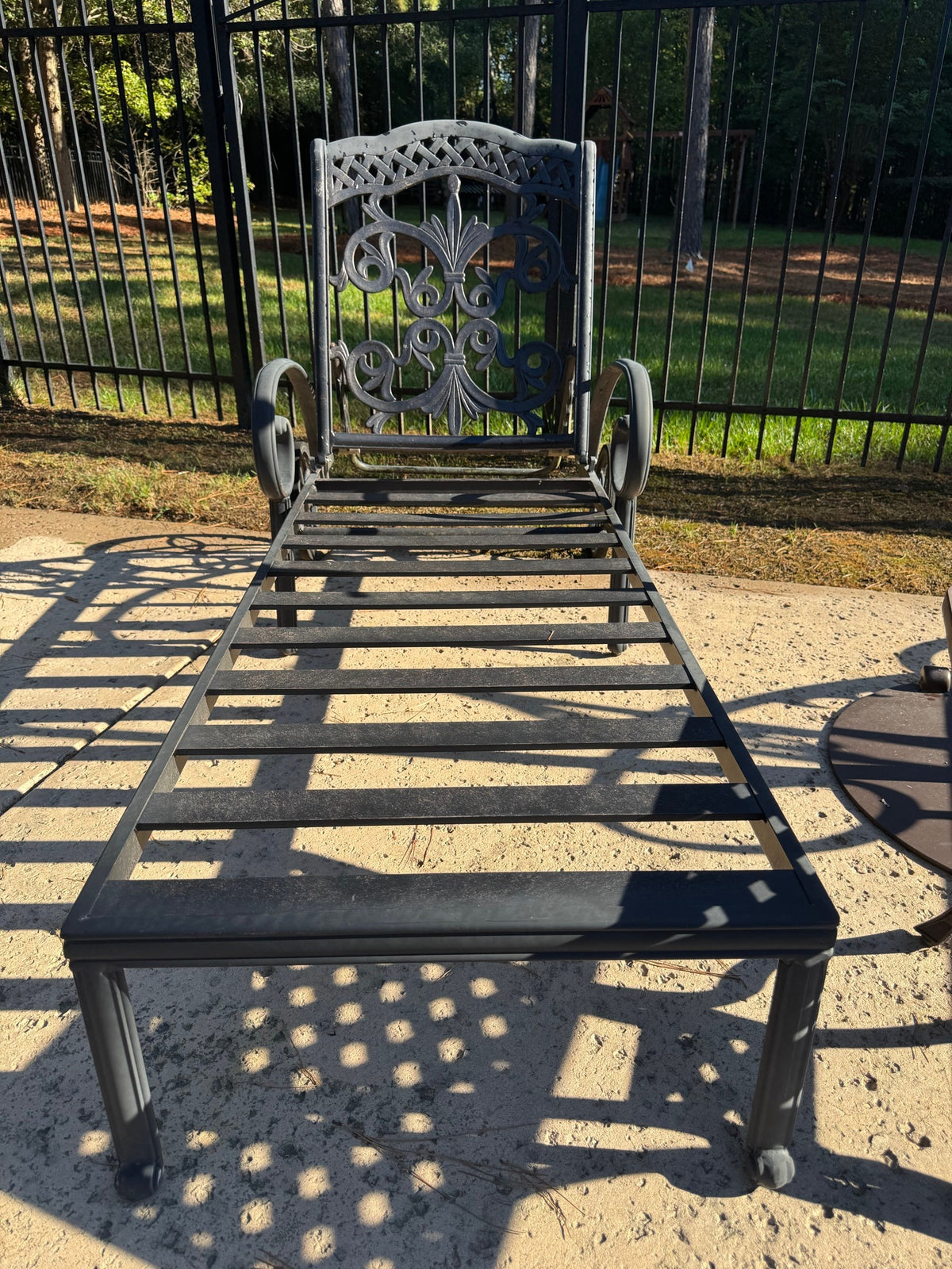 Two Cast Aluminum Chaise Loungers, Scrollwork, with Side Table and Umbrella, Poolside
