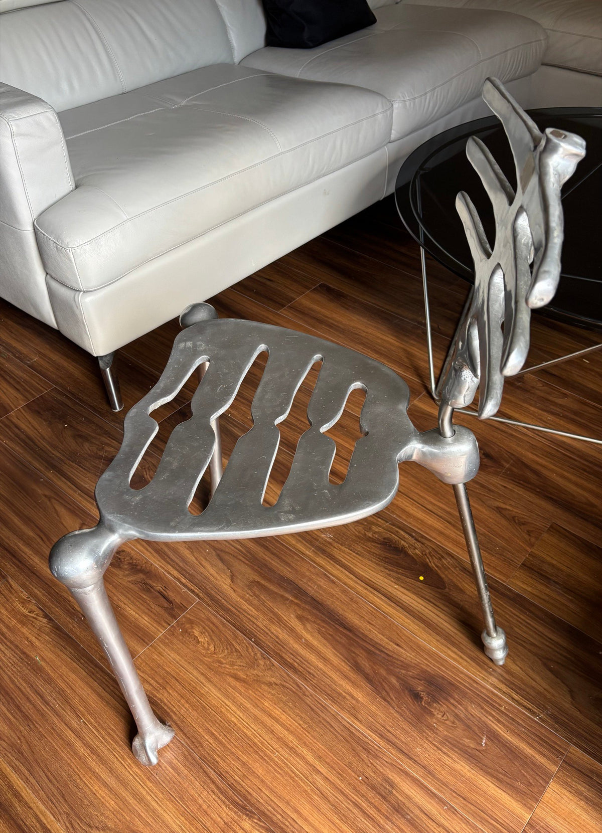 Skeleton chair indoors from the side