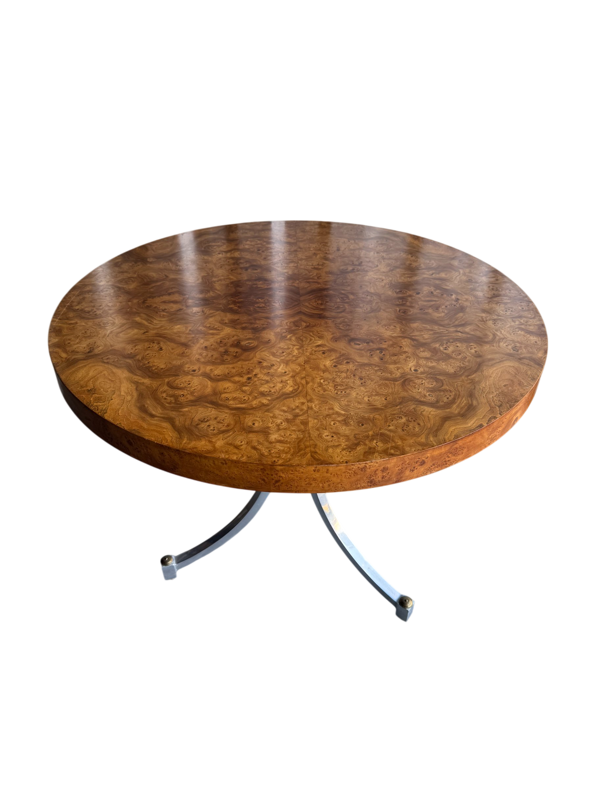 Burl wood round tabletop with figured grain pattern, polished finish, viewed from above at angle
