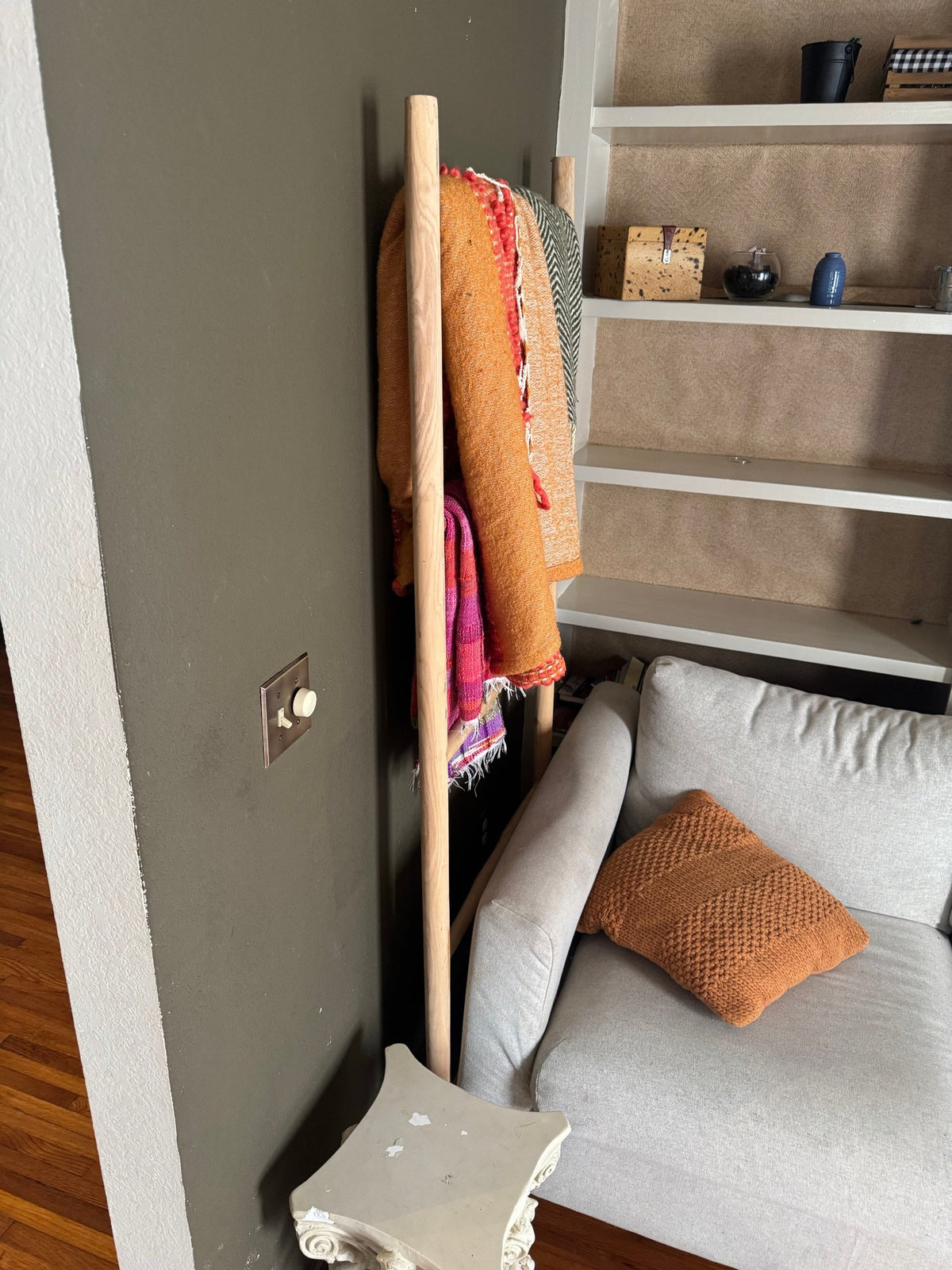 Blanket ladder leaning against a wall