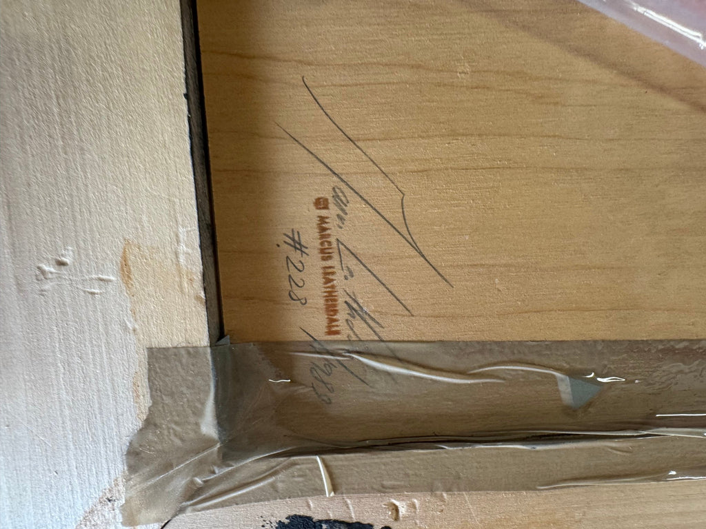 Stamp and pencil signature on the back