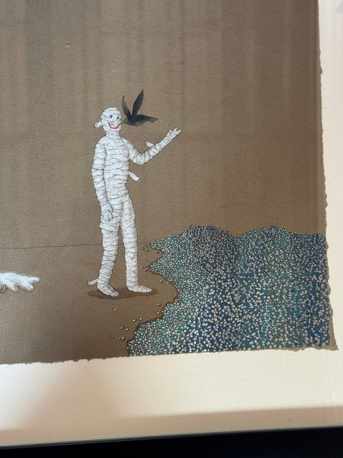 Detail of the mummy figure and bird