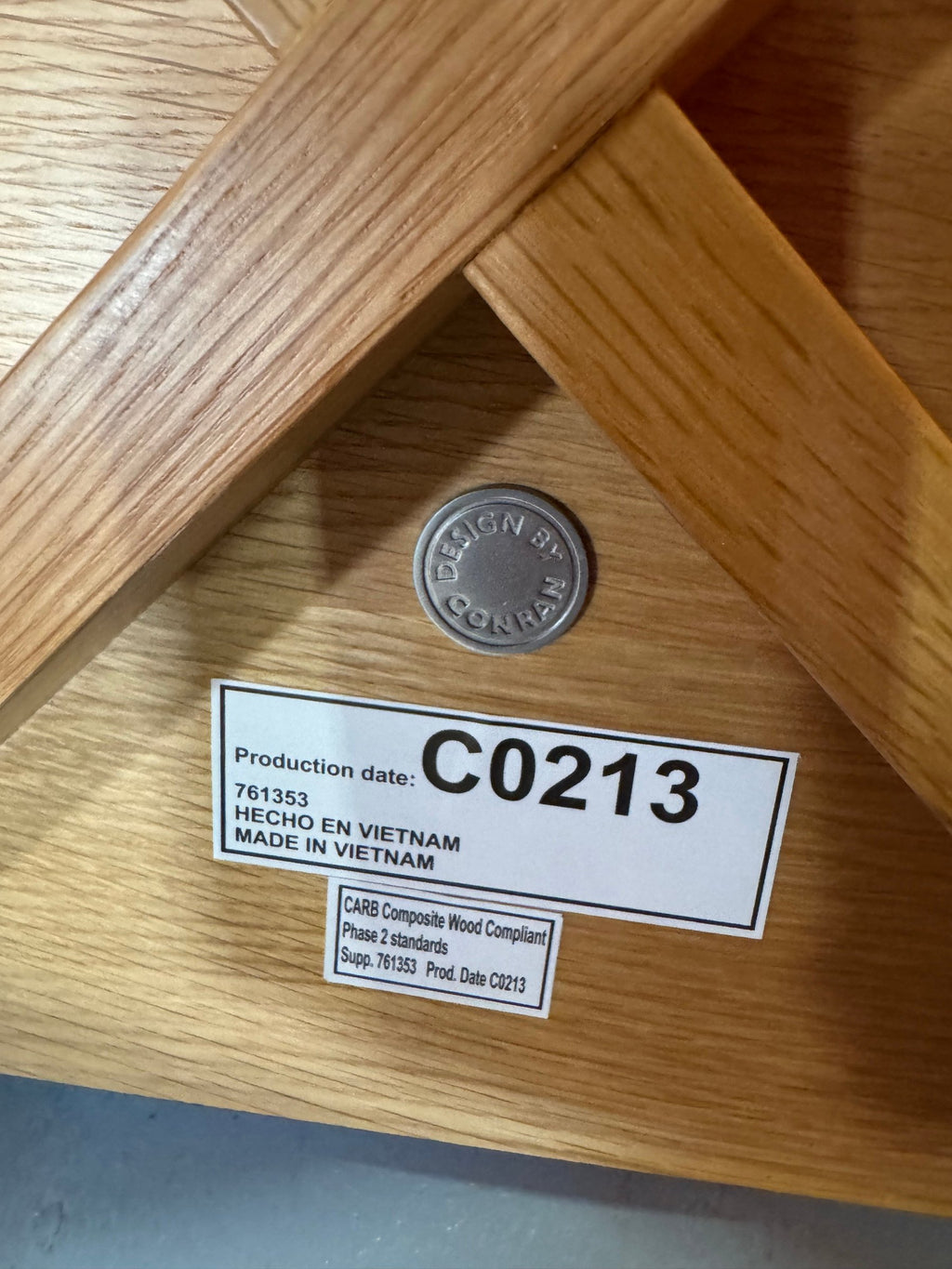 Underside medallion reading Design by Conran beside the compliance label