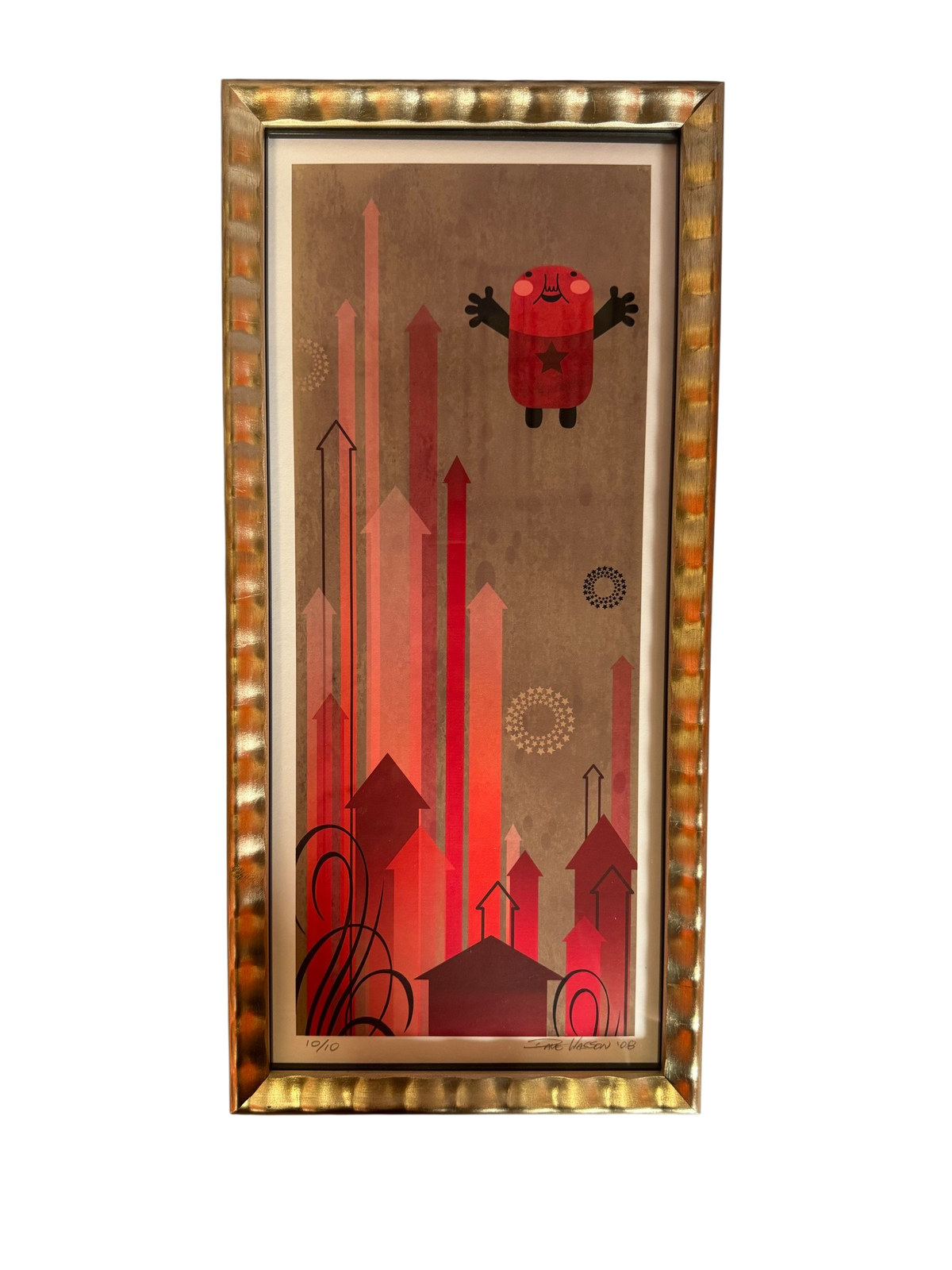 Framed print of red arrows and a robot in a gold frame, straight-on