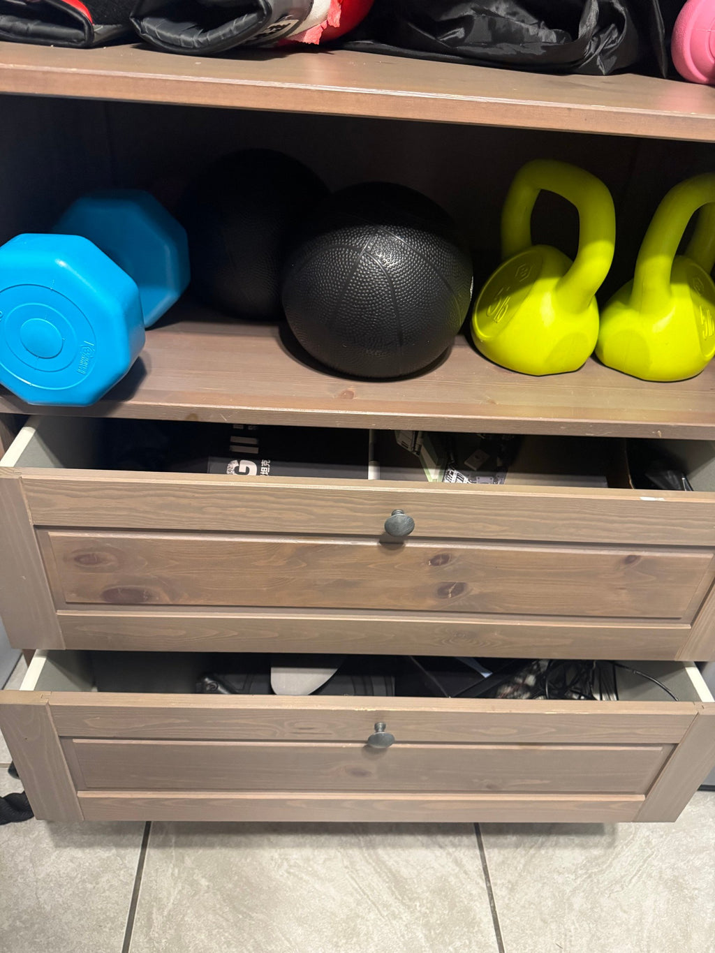 Cabinet drawers with one drawer open