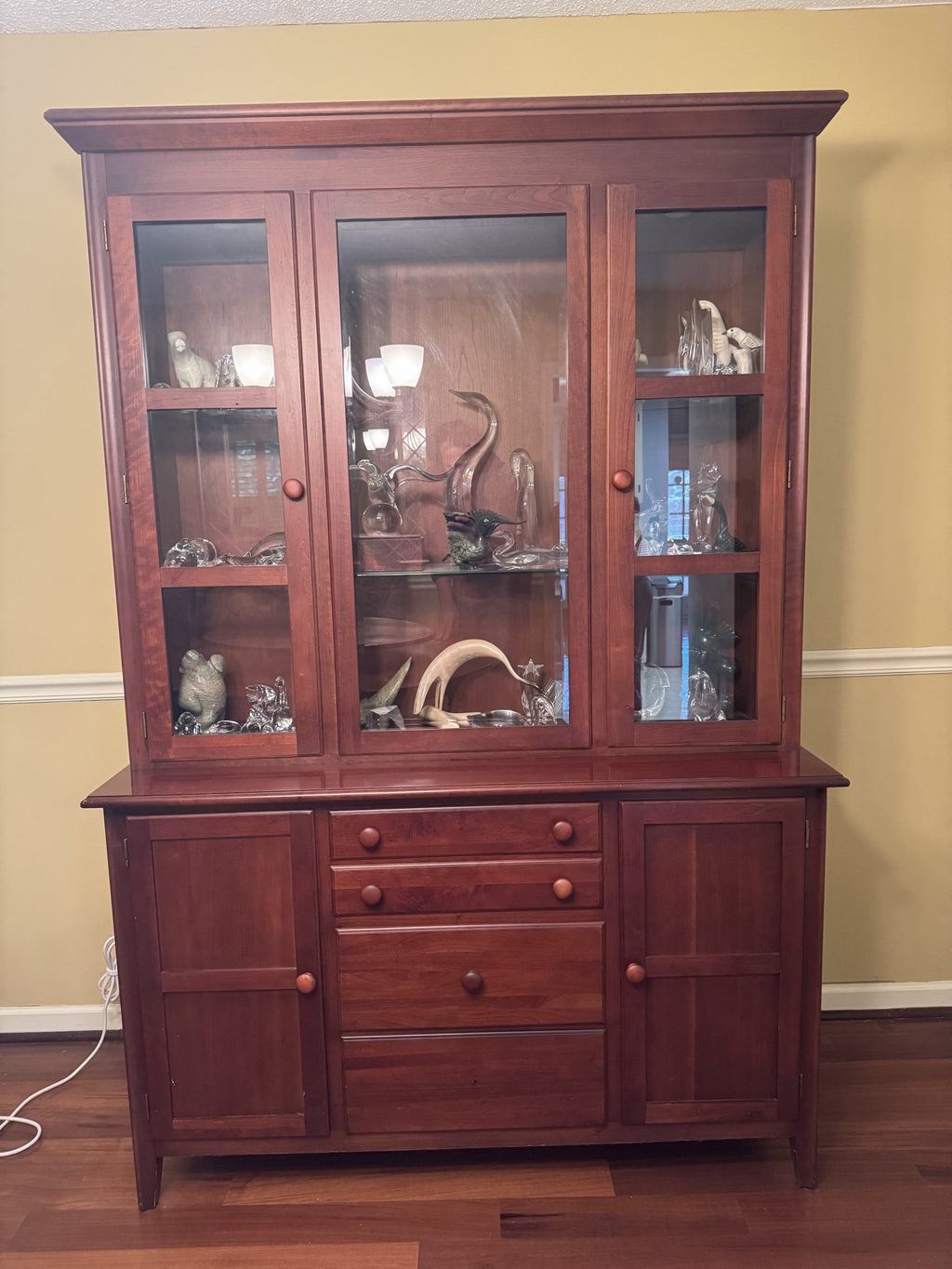 China cabinet from the front, glass doors over the buffet base