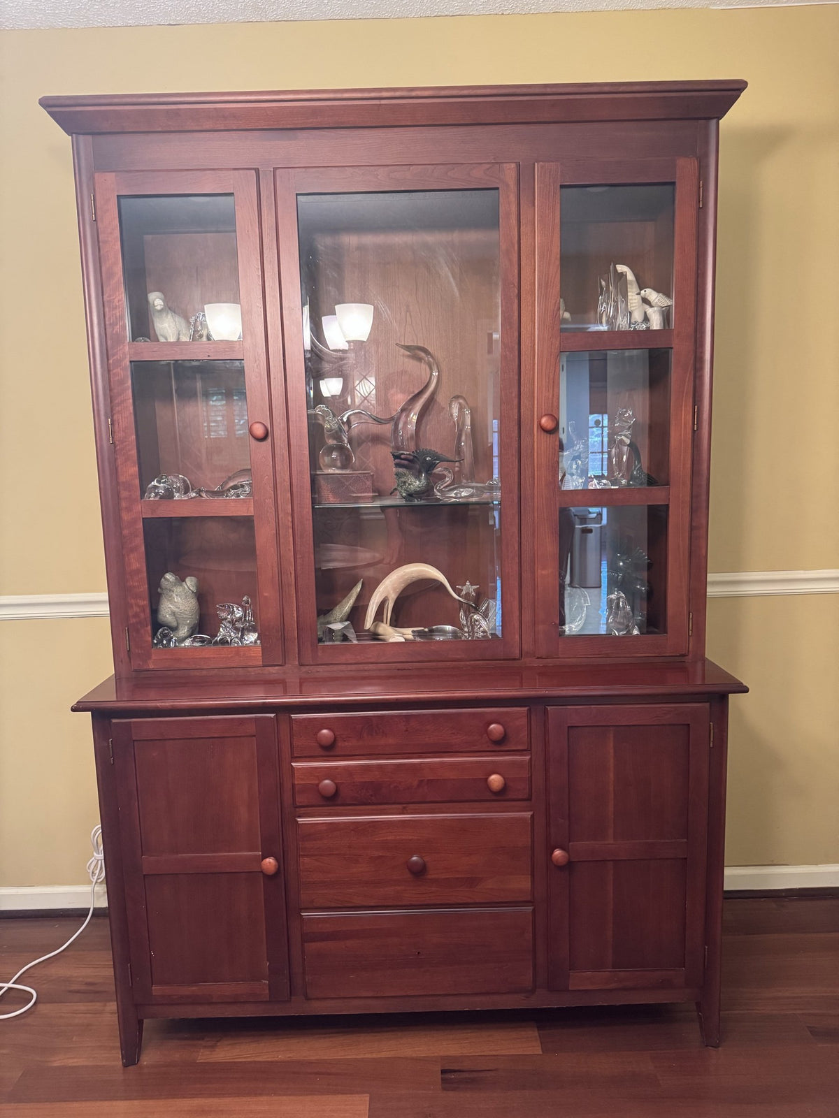 China cabinet from the front, glass doors over the buffet base