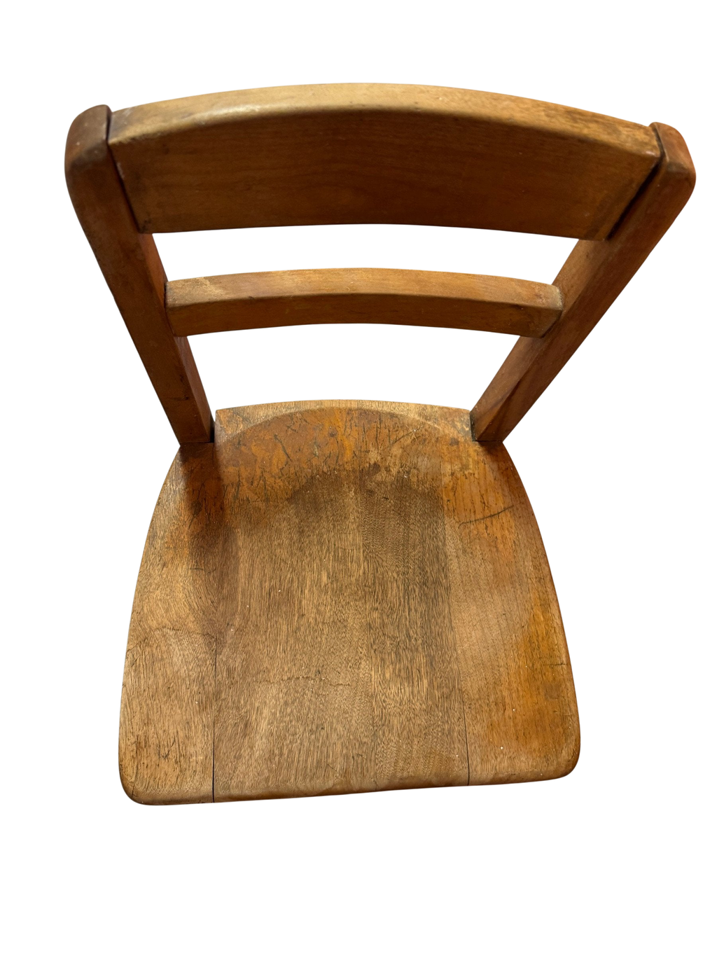Child's wooden school chair from the side showing seat and back slats