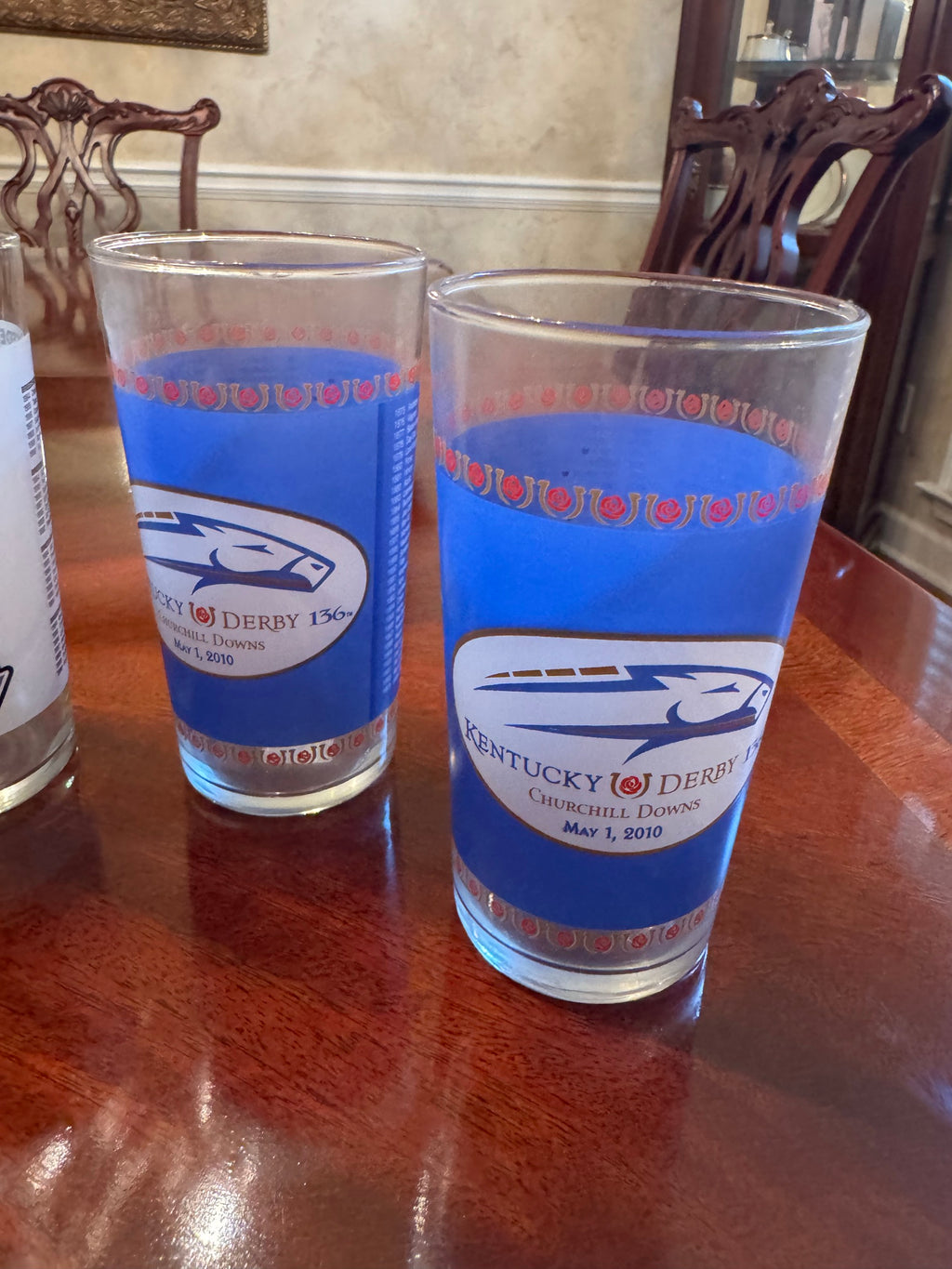 Two Kentucky Derby 136th 2010 glasses with blue band and rose horseshoe border