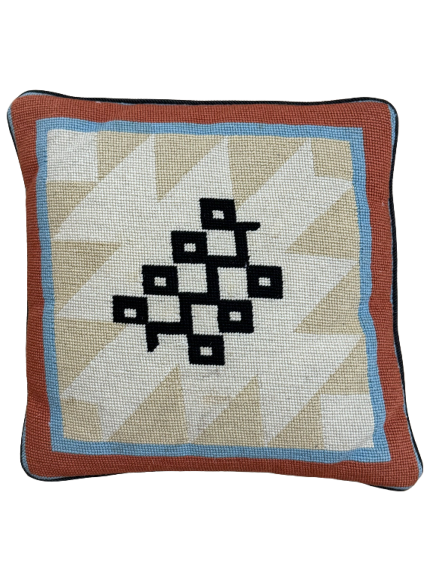 Vintage needlepoint pillow front with rust, blue, cream borders and black geometric diamond pattern center