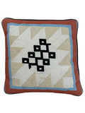 Vintage needlepoint pillow front with rust, blue, cream borders and black geometric diamond pattern center