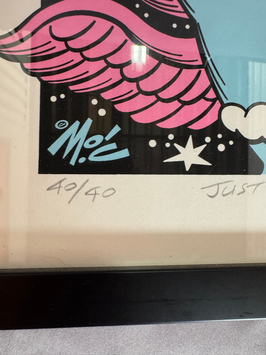Printed Mo'C mark and 40/40 edition number
