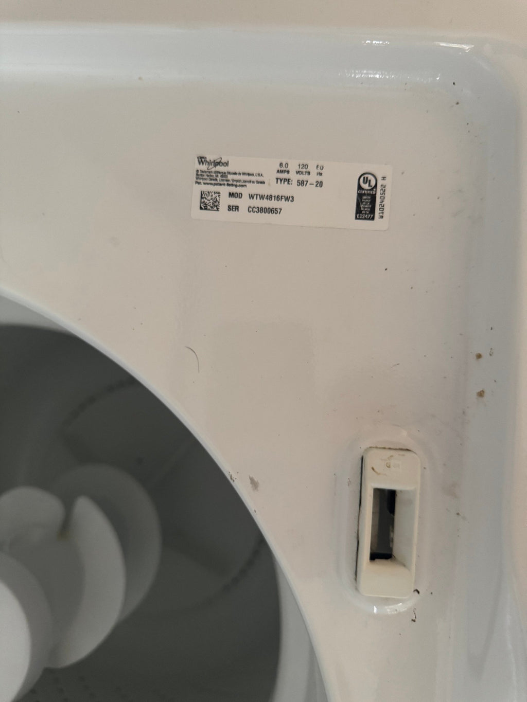 Whirlpool model label on the washer