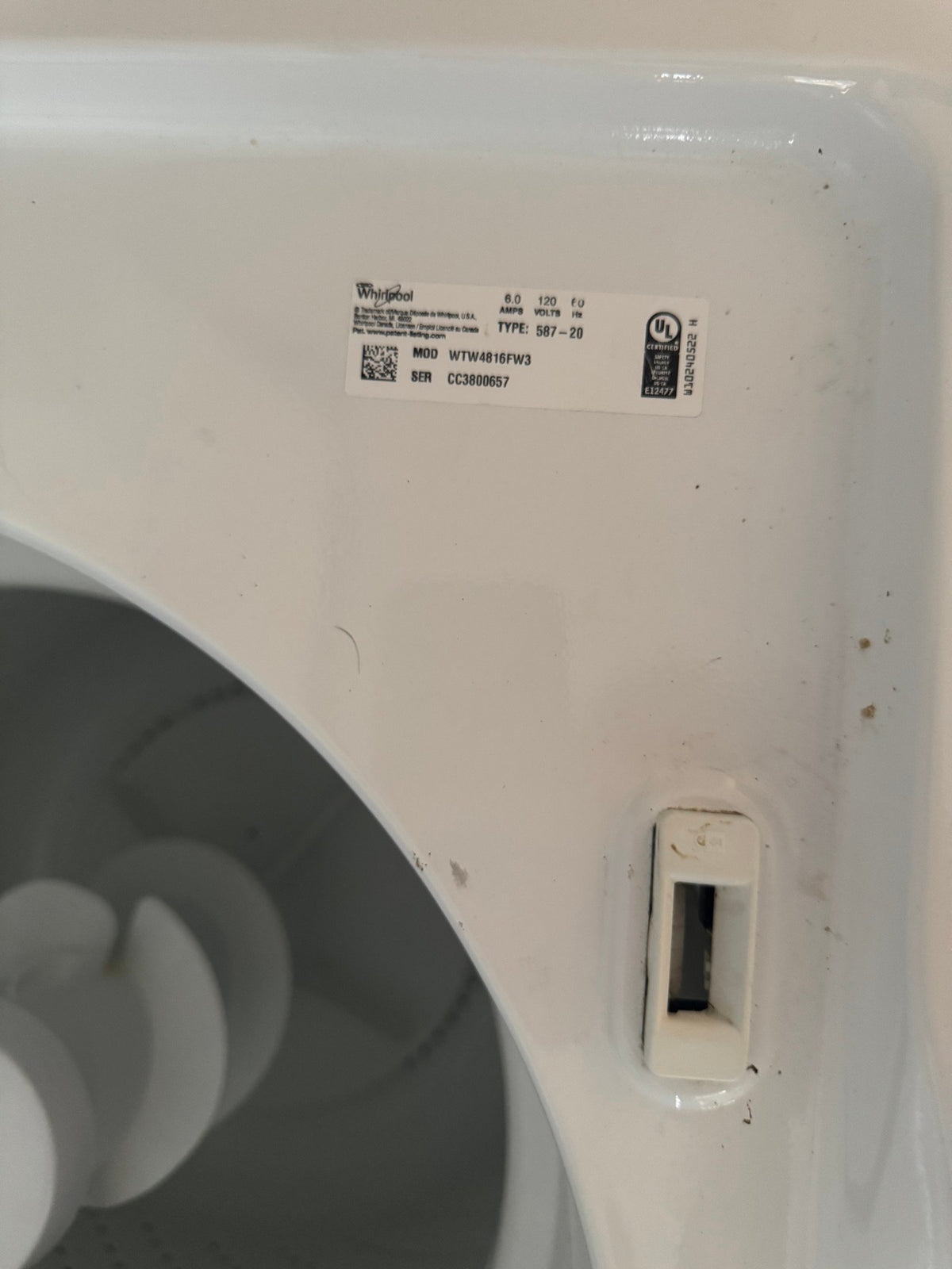 Whirlpool model label on the washer