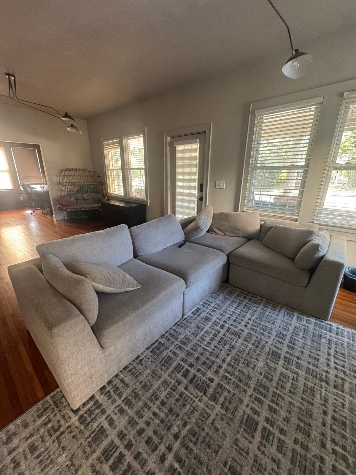Grey five-piece modular sectional with chaise, wide view