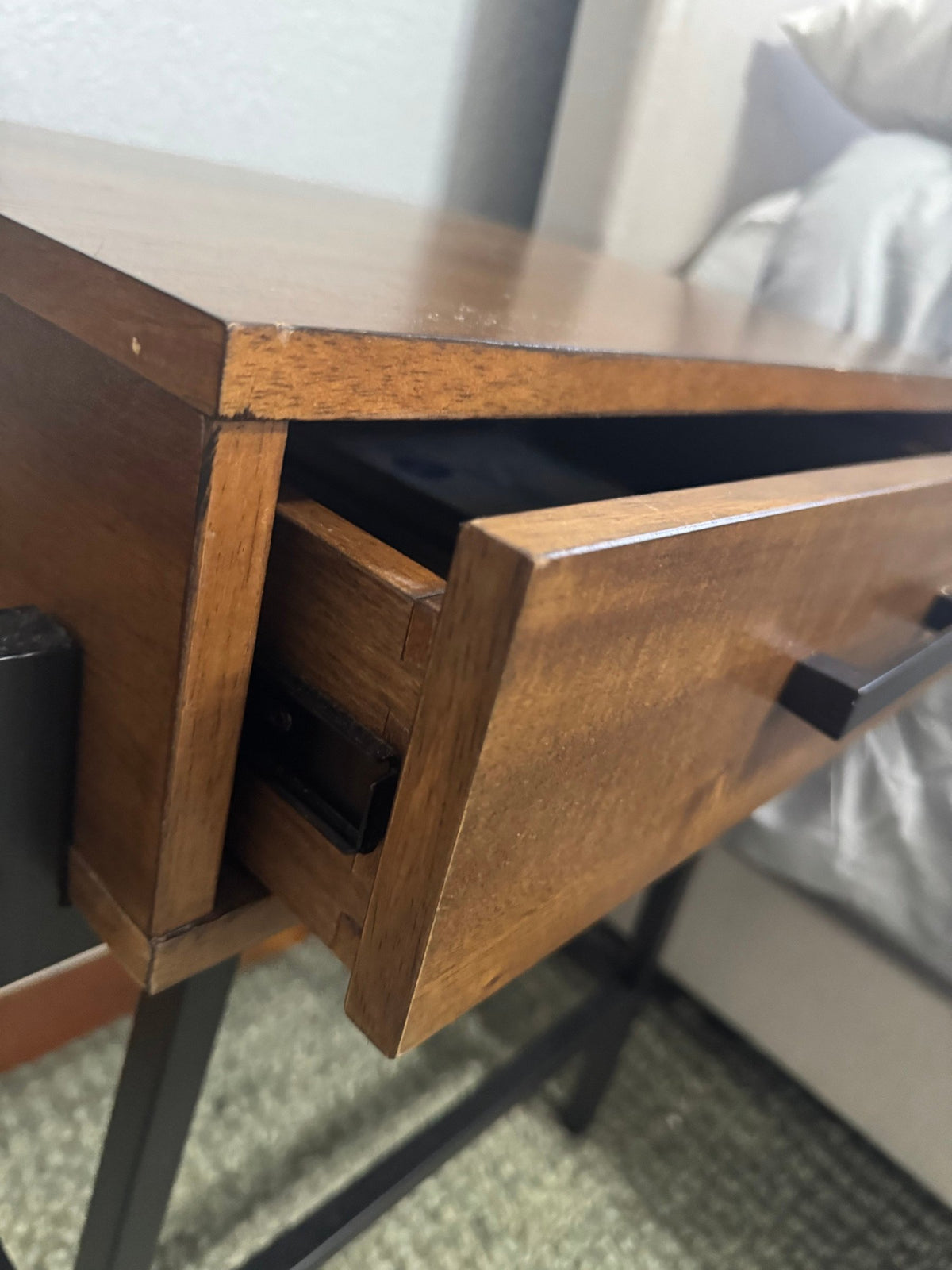 Open drawer and metal handle