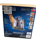 Product packaging box showing Bissell SpotClean ProHeat Pet carpet cleaner with brown dog and purple machine visible
