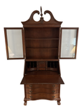 Mahogany Chippendale-style secretary with doors and slant front open, seen from the front