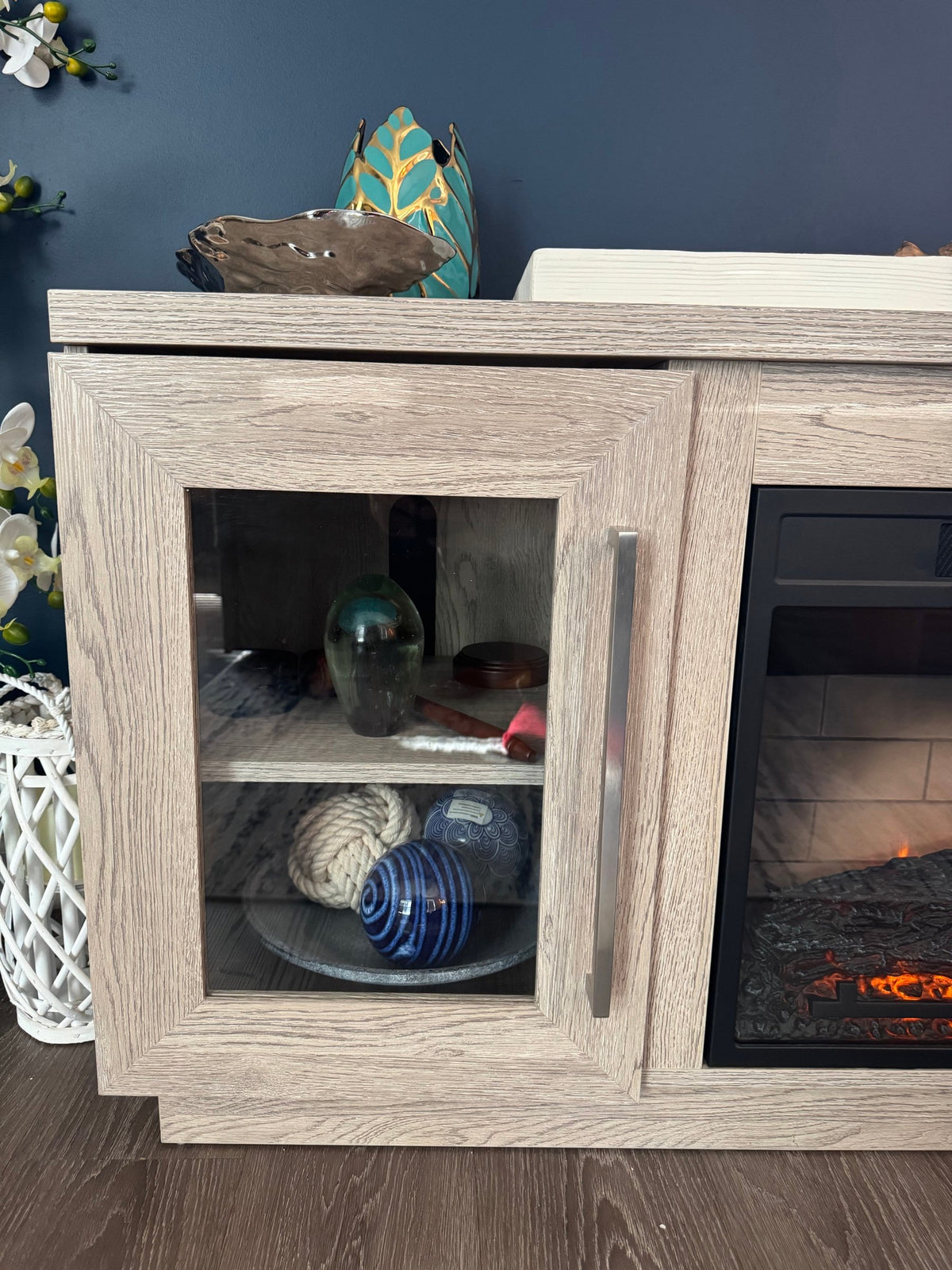 Glass-door side cabinet with shelf