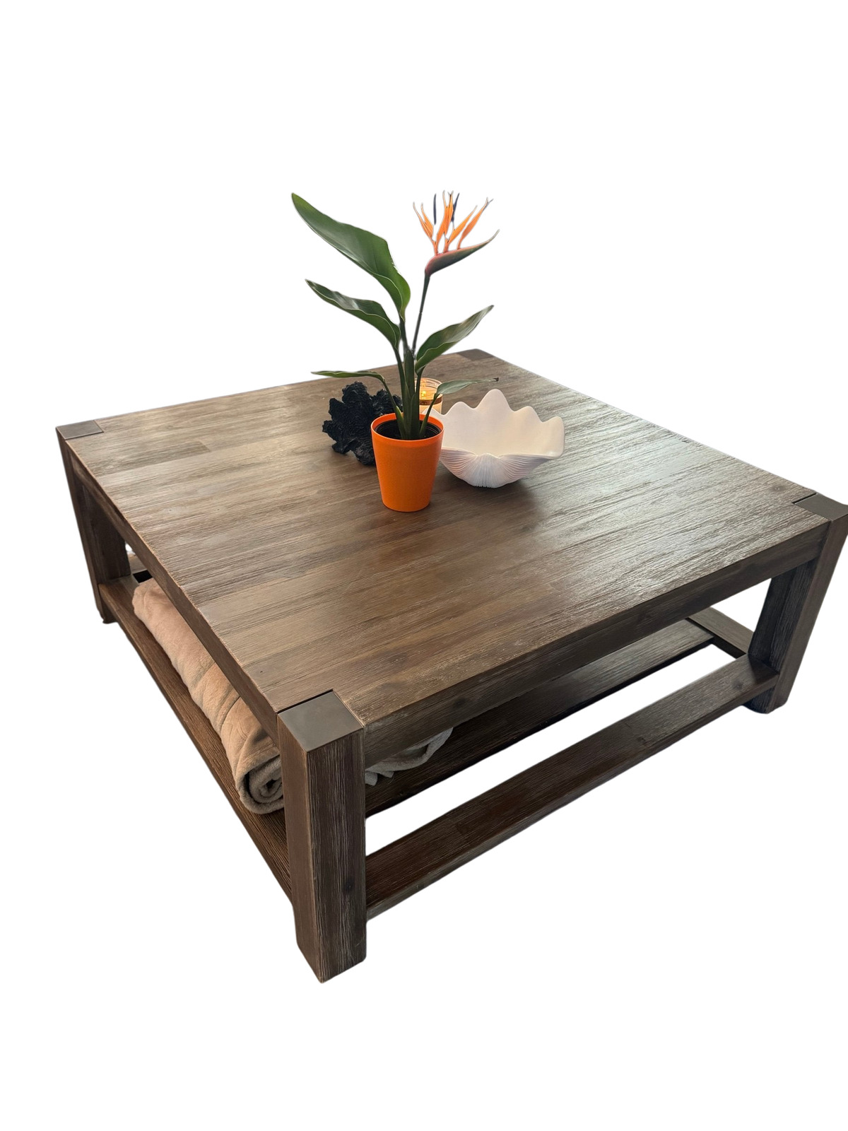Square rustic wood coffee table in a living room