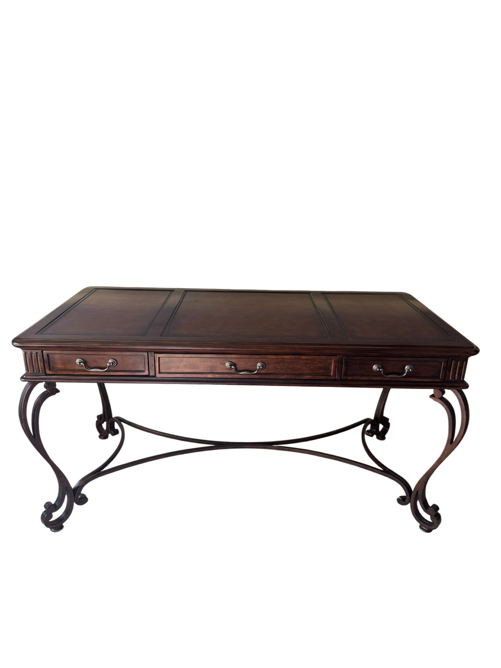 Full front view of wooden desk with three drawers, ornate curved legs, and tooled leather top surface