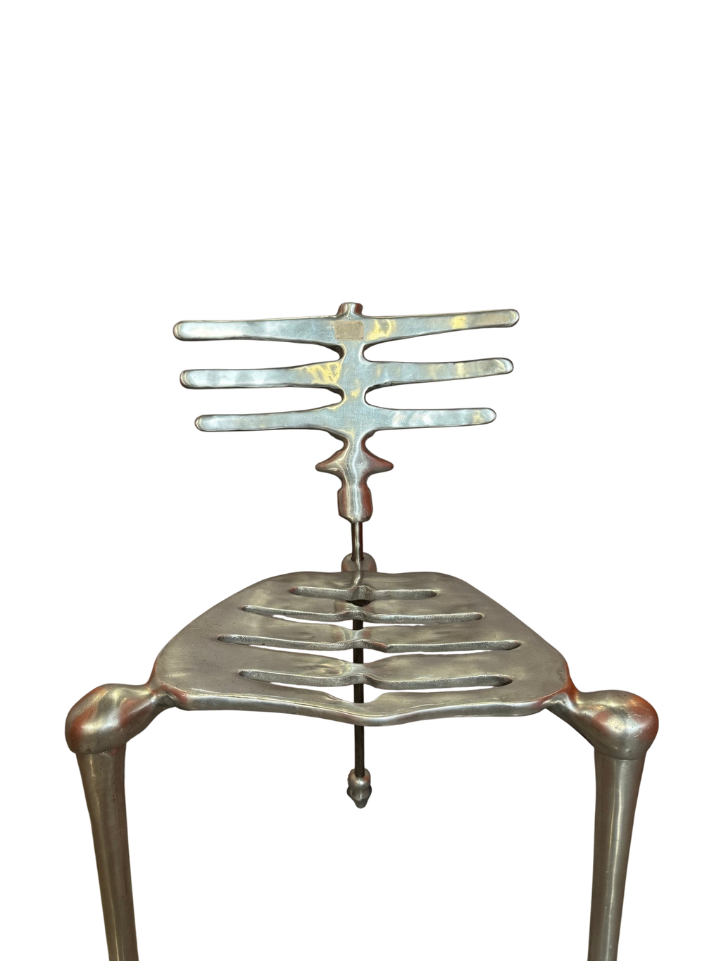 Skeleton chair from above showing rib back and seat