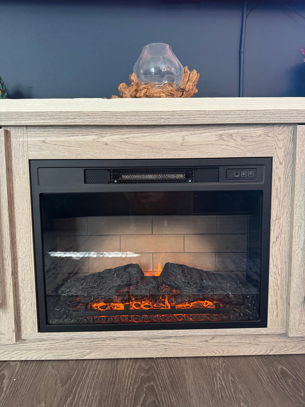 Electric fireplace insert with flame effect on