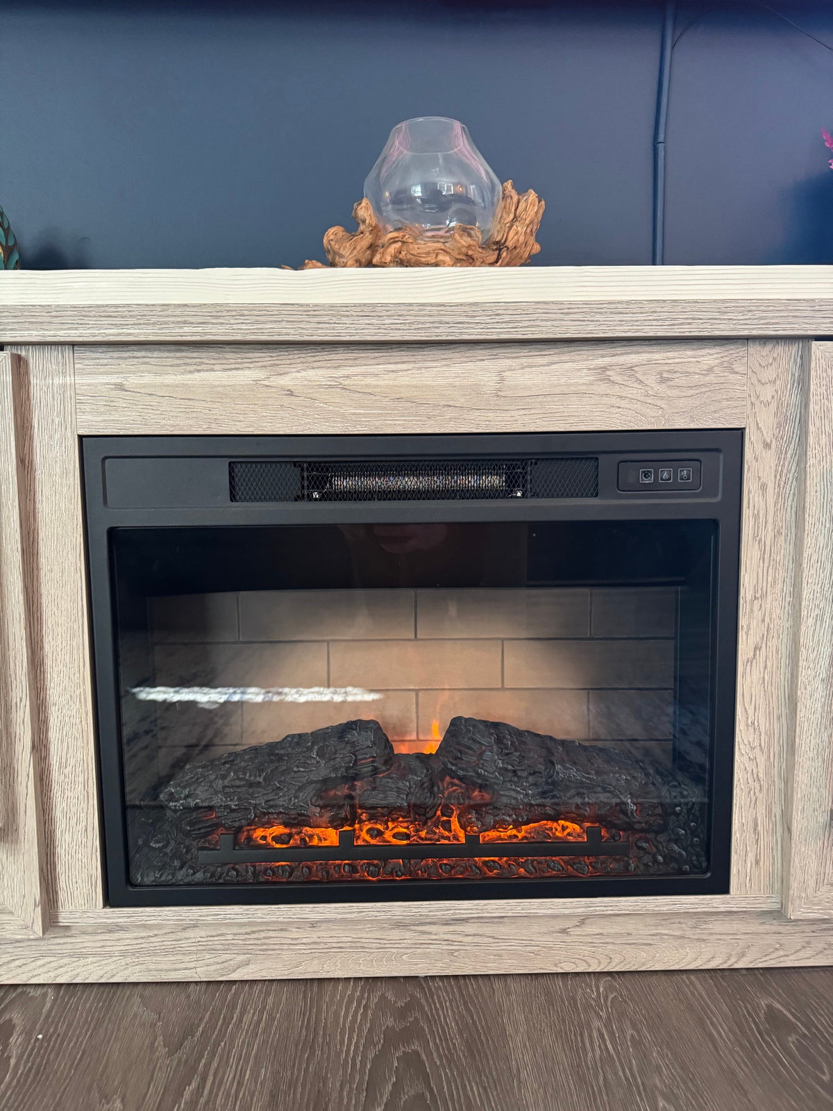Electric fireplace insert with flame effect on