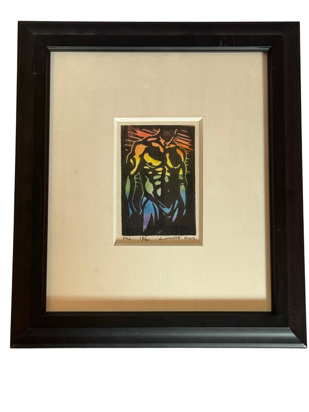 Framed rainbow linocut of a torso with large mat, straight-on