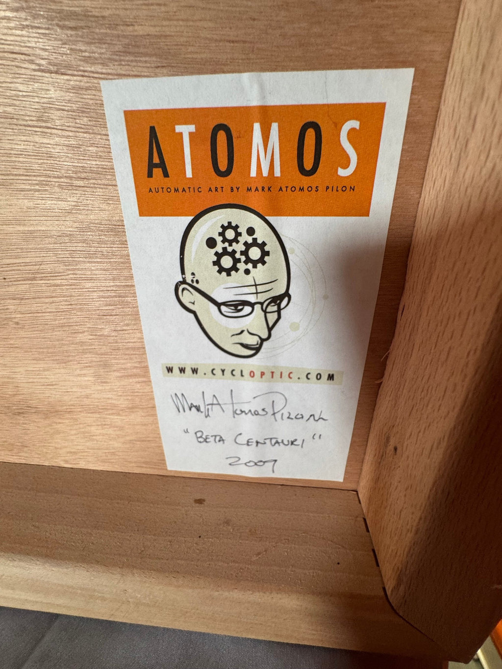 Label on the back with title and year