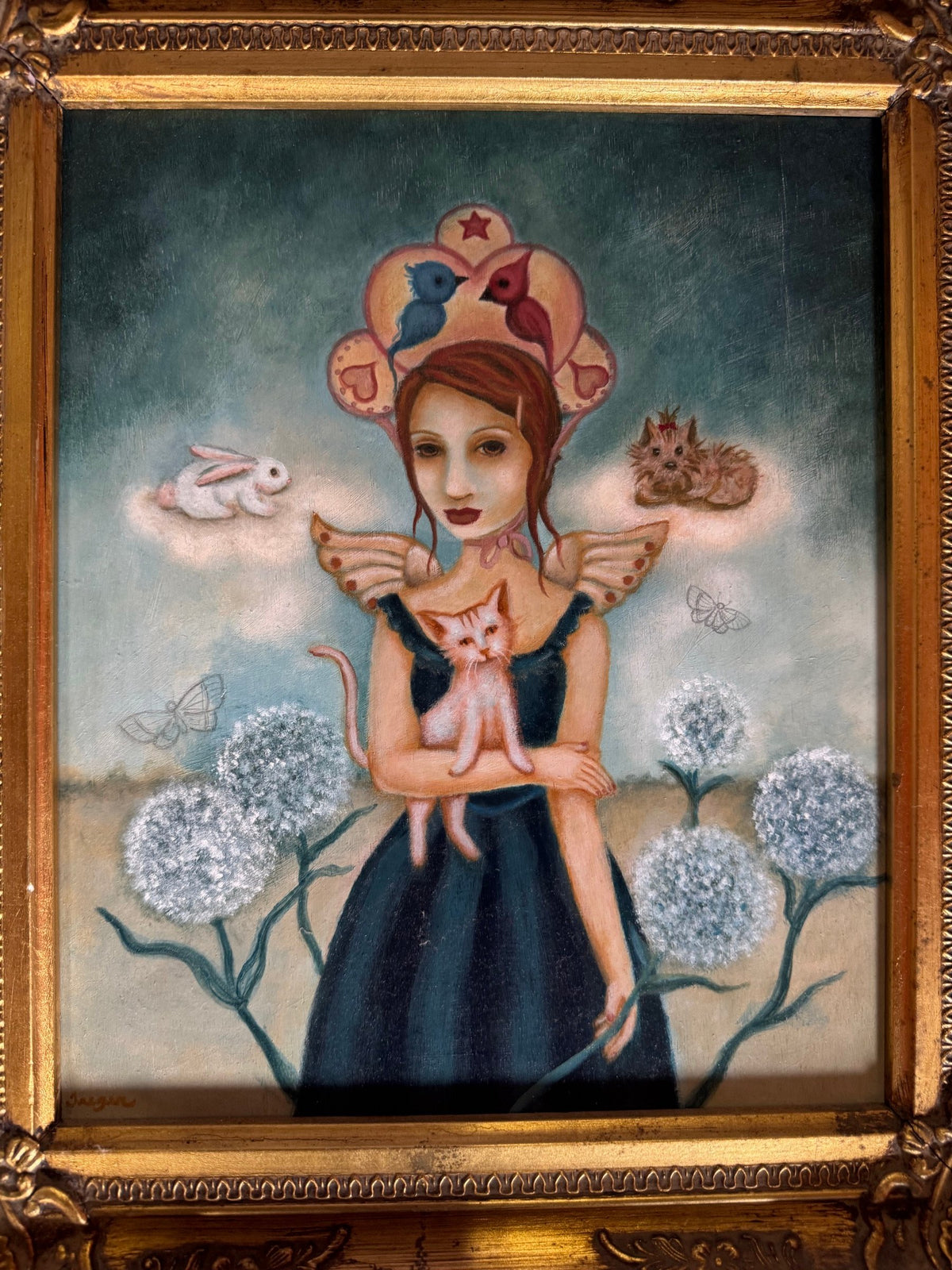 Alternate angle of the framed oil painting