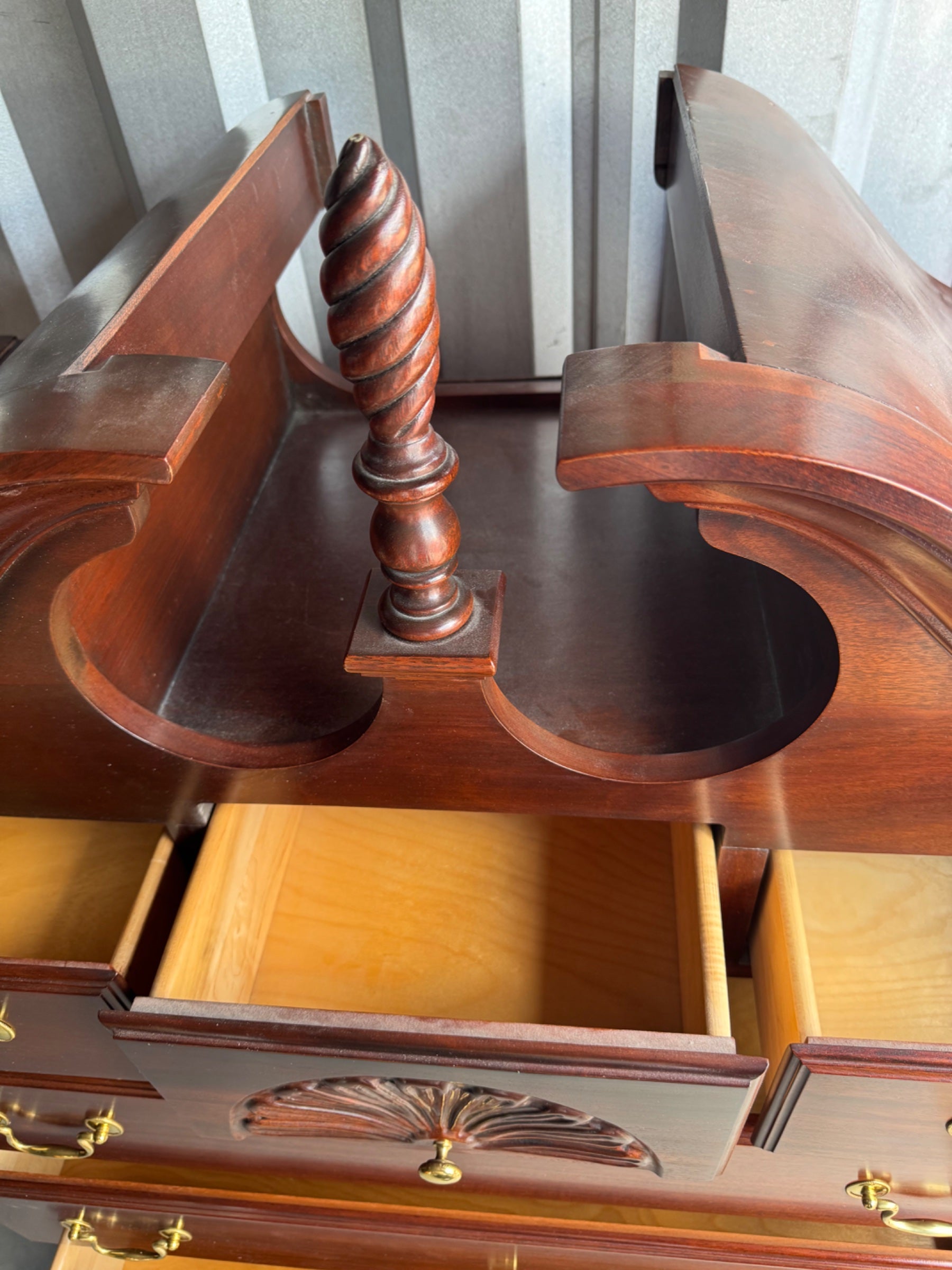 Lowboy base front view showing decorative hardware, shell carving center detail, and curved cabriole leg support