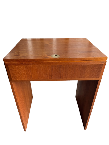 Danish teak vanity desk model 258, front view showing closed top with mirror storage compartment and angled legs