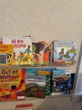 Children's picture books on a shelf