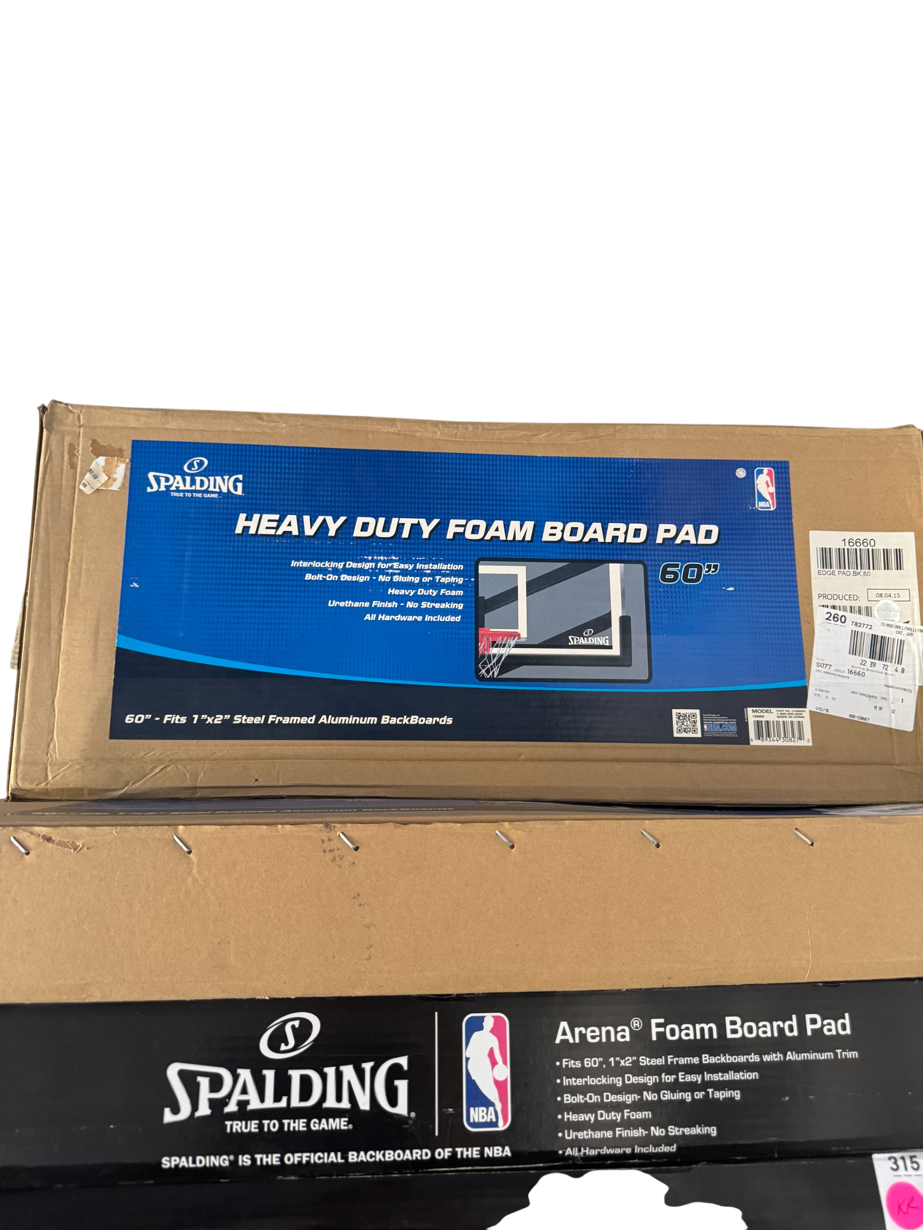 Spalding Heavy Duty Foam Board Pad 60 inch boxed package, blue and black cardboard box with NBA branding and product details visible