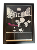 Passive Moles poster print in black frame, straight-on