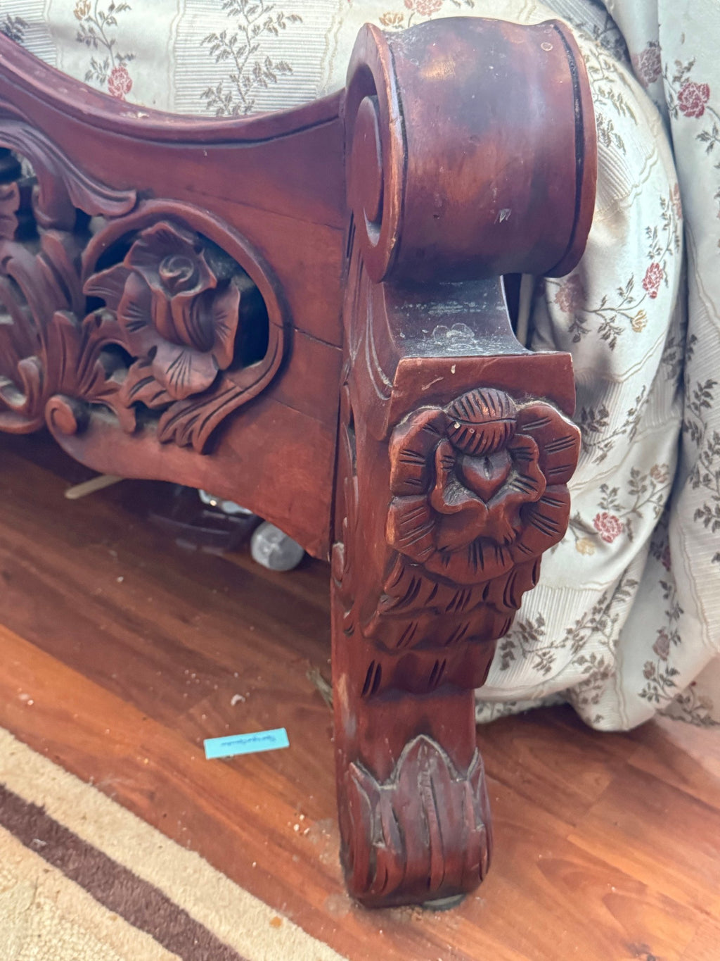 Footboard post with carved rose and scroll finial