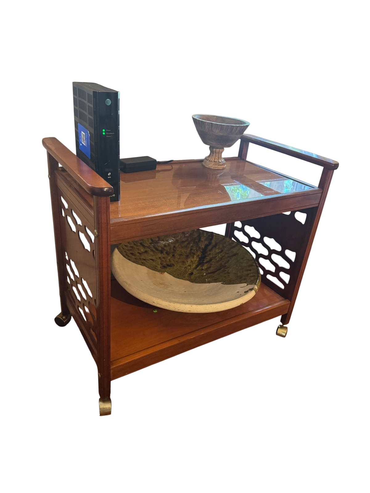 Wood tea trolley with pierced sides and casters