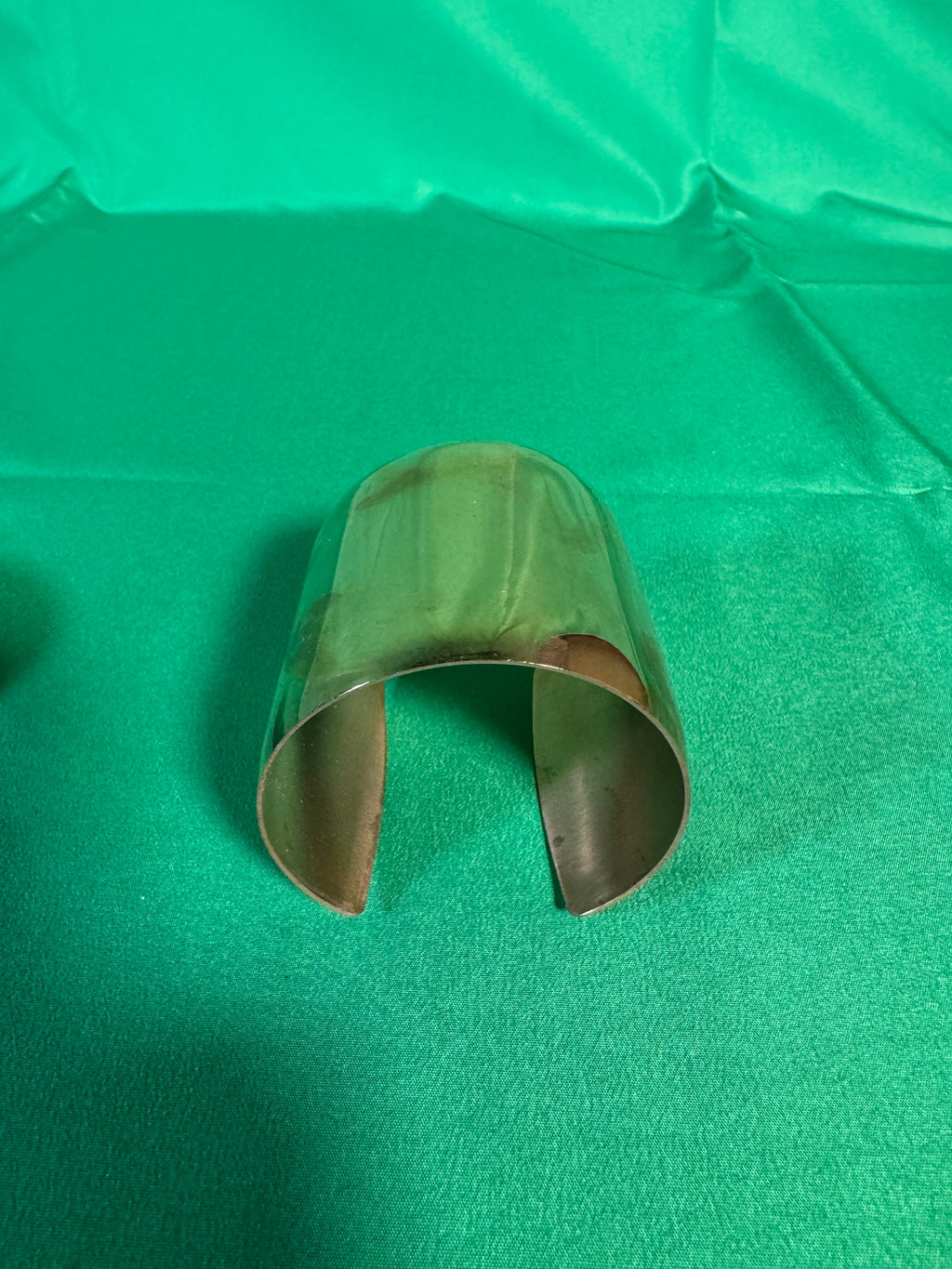 Costume Bracelet Lot Two Wide Cuffs and a Hinged Bangle — detail view 1