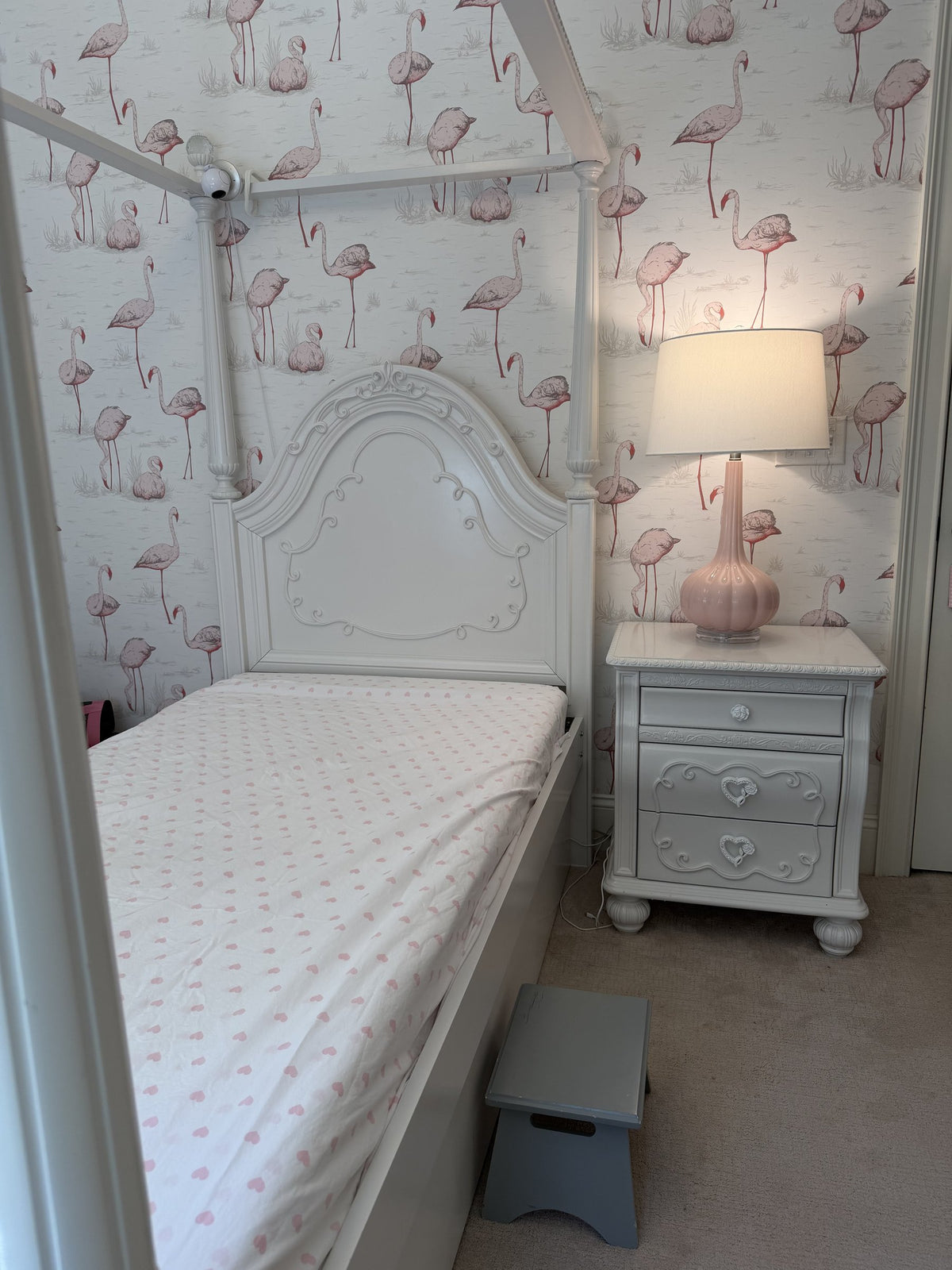 Sparkle White canopy bed from the side