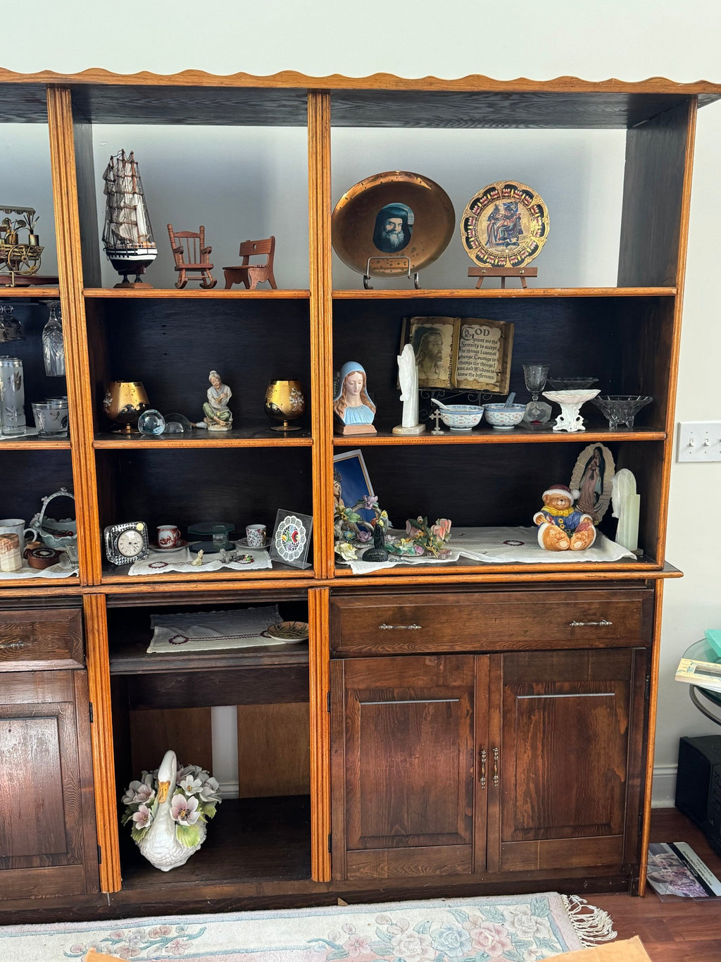 Right section of the wall unit with open shelves and cabinet doors below