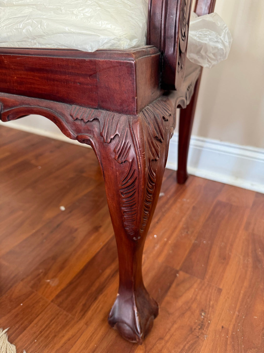 Chair leg with carved knee and ball-and-claw foot