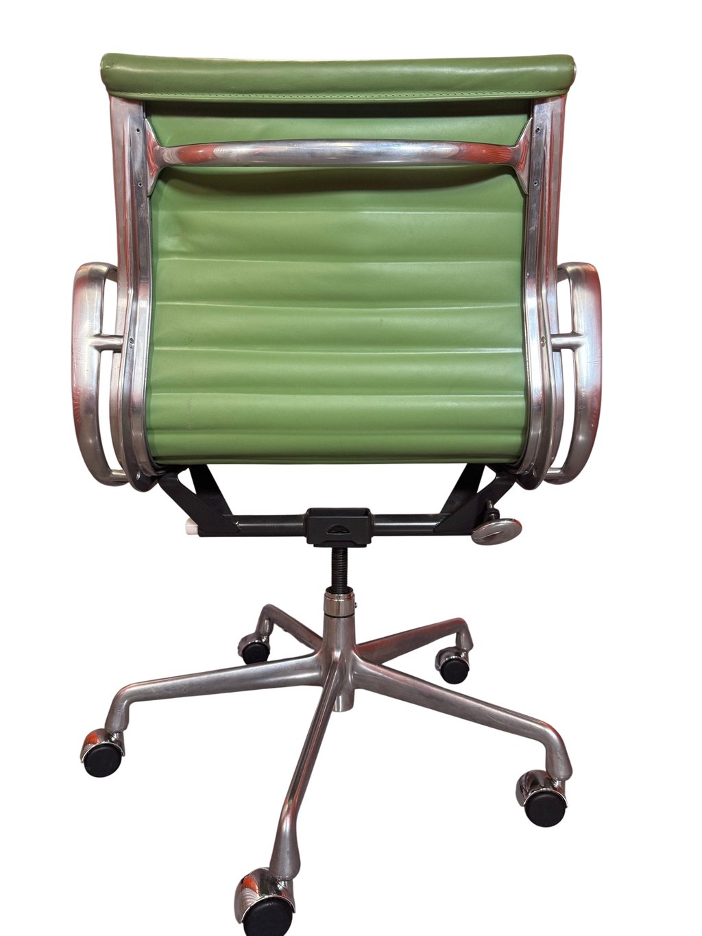 Back of the green office chair showing ribbed back panel
