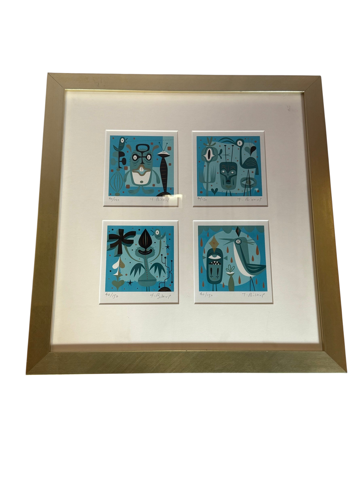 Four blue screenprints in one gold frame, straight-on