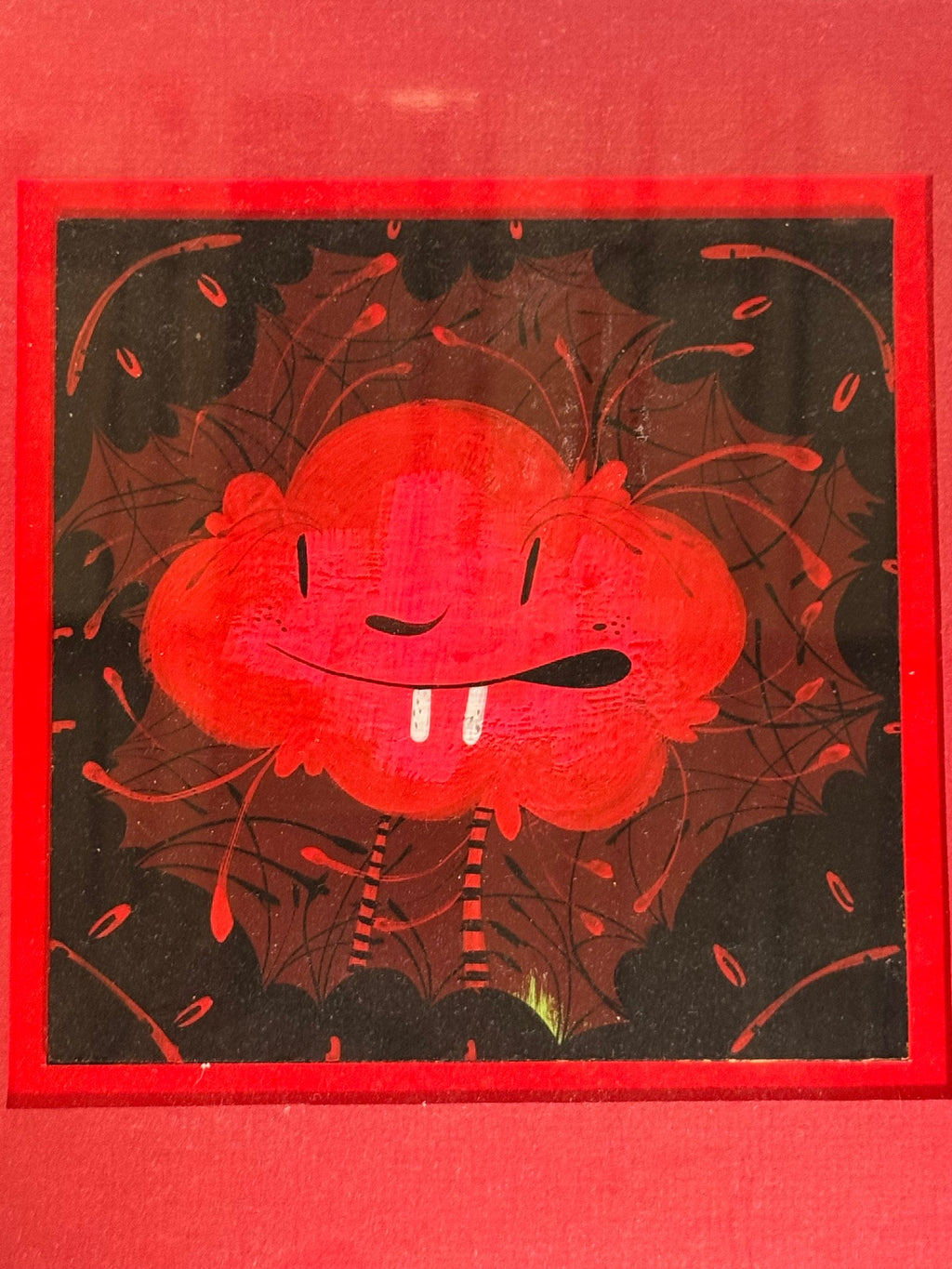 Close view of the painted image and red mat